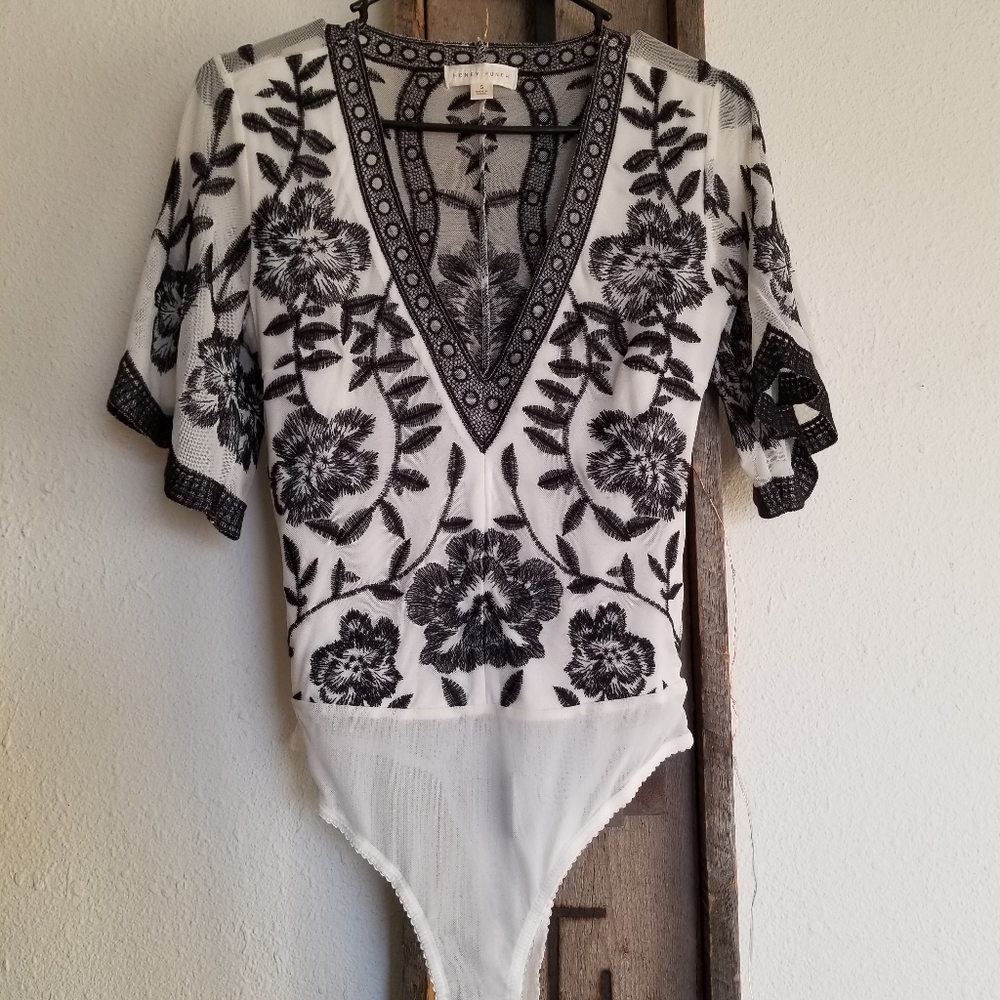 Black embroidered white bodysuit